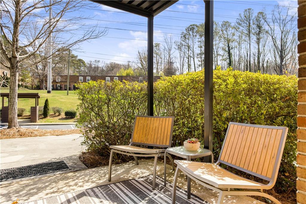 1261 Lavista Road Northeast, Unit E9 Atlanta, GA 30324 - Photo 23 of 27 a view of outdoor space with seating area
