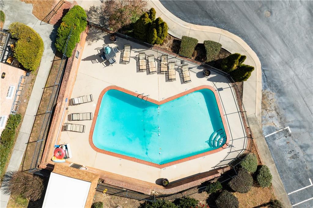 1261 Lavista Road Northeast, Unit E9 Atlanta, GA 30324 - Photo 26 of 27 an aerial view of a fireplace with wooden floor