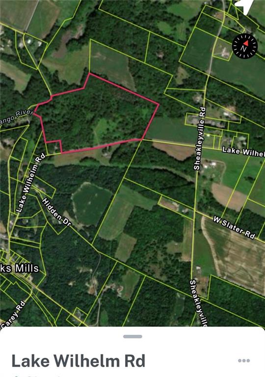 0 Lake Wilhelm Road Clarks Mills, PA 16114 - Photo 1 of 7 a backyard with a garden and plants