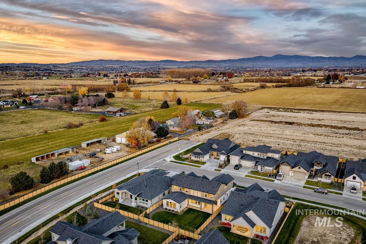 21913 Paint Avenue Star, ID 83669 - Photo 32 of 45 Aerial perspective of suburban area featuring a mountain backdrop