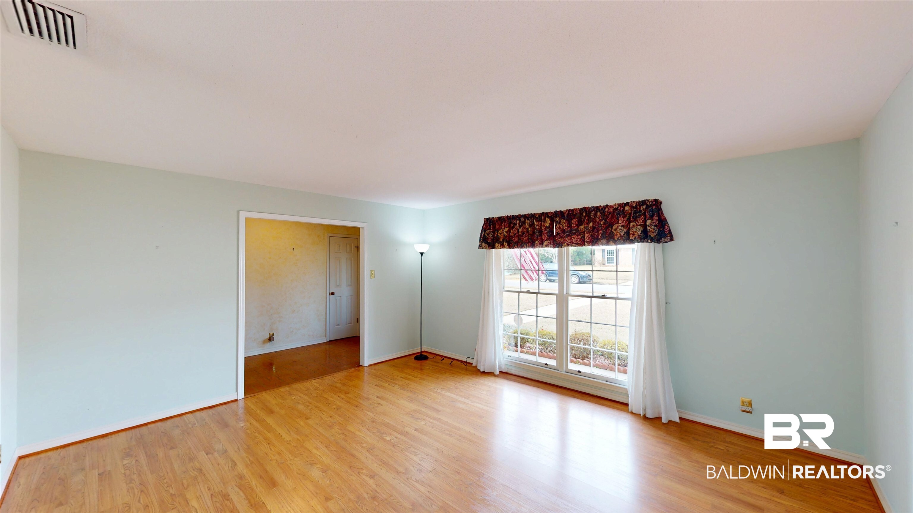 609 Burlington Court Mobile, AL 36608 - Photo 3 of 19 Unfurnished room with light wood-style floors and baseboards
