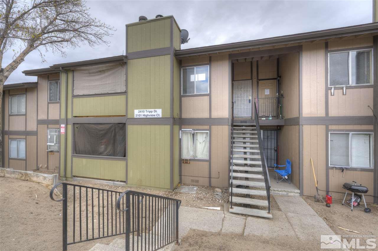 2101 Highview Court, Unit 14 Reno, NV 89512 - Photo 1 of 16 a view of a brick house with a large window