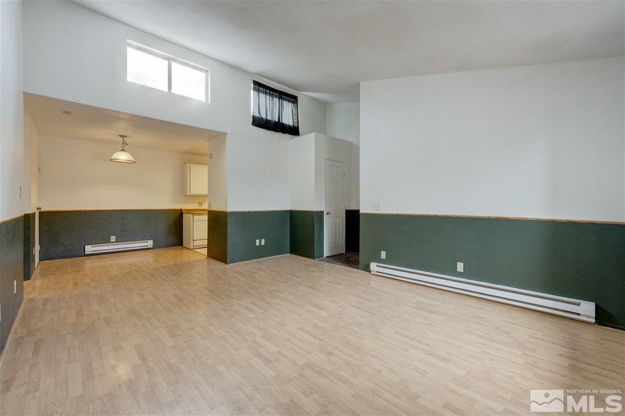 2101 Highview Court, Unit 14 Reno, NV 89512 - Photo 6 of 16 a view of a room with window and a ceiling fan
