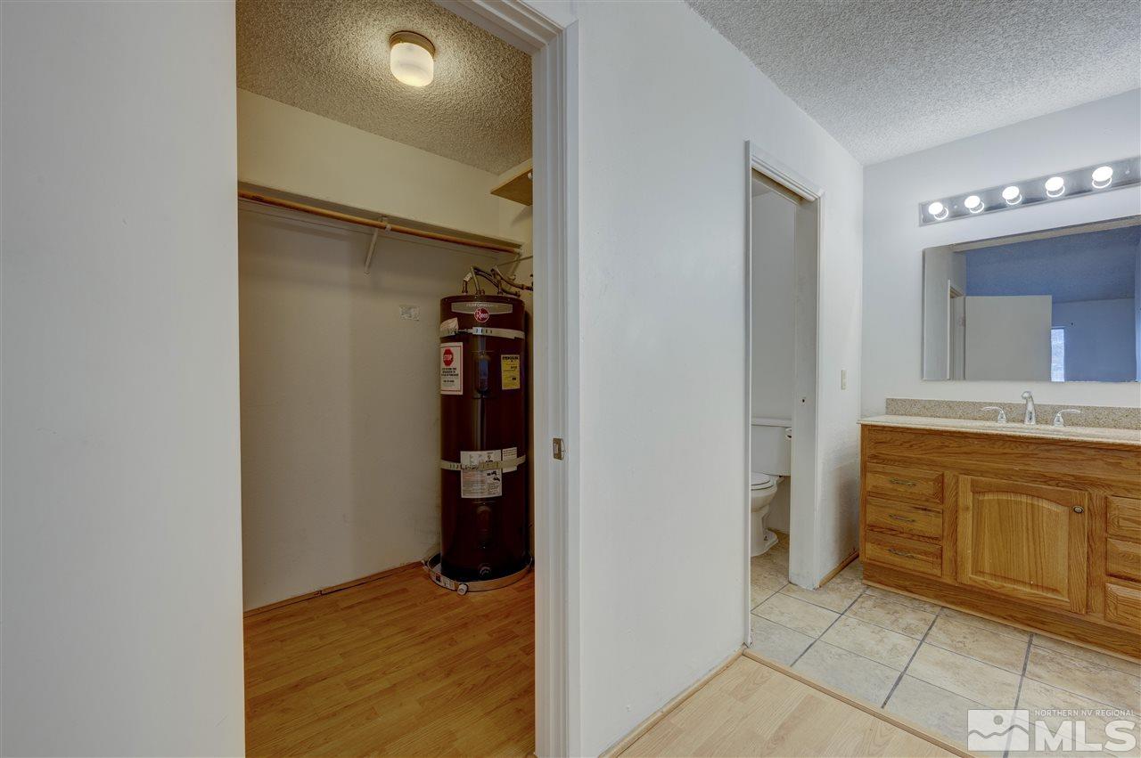 2101 Highview Court, Unit 14 Reno, NV 89512 - Photo 10 of 16 a bathroom with a sink and a mirror