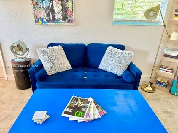 a living room with furniture and a couch