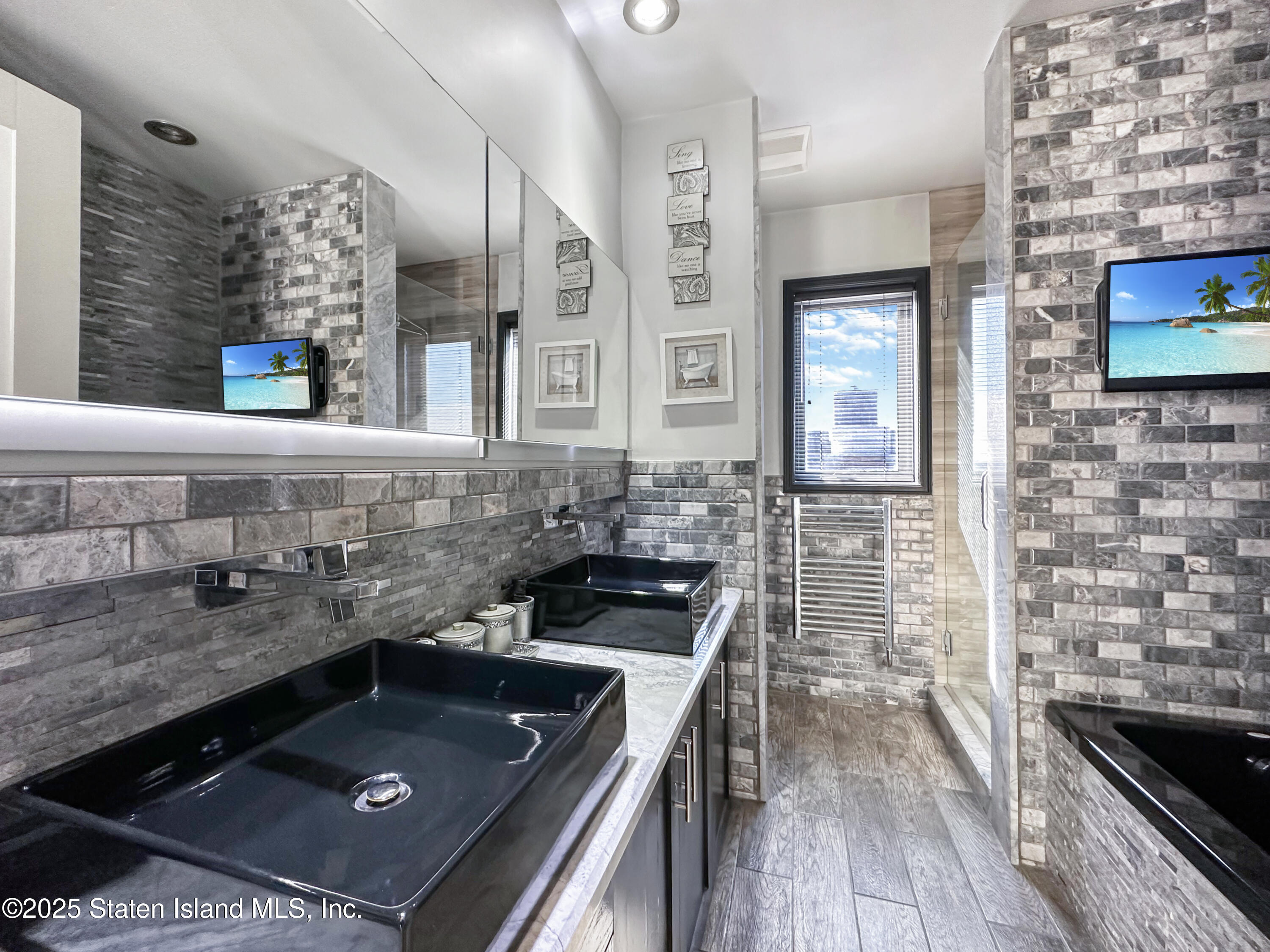 90 Bay Street Landing, Unit 9C Staten Island, NY 10301 - Photo 18 of 38 a kitchen with a sink stove and cabinets