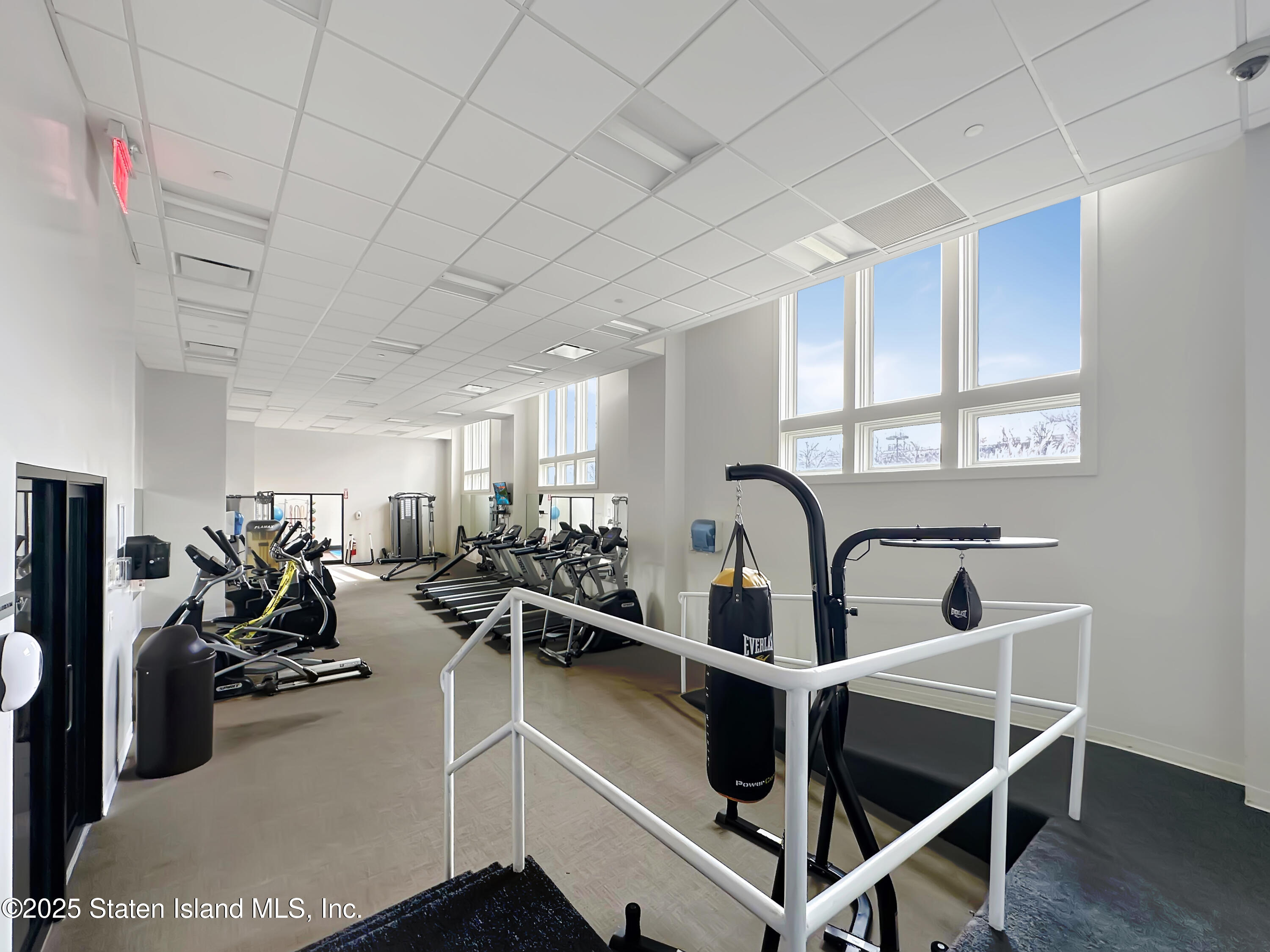 90 Bay Street Landing, Unit 9C Staten Island, NY 10301 - Photo 36 of 38 a very nice looking room with many windows