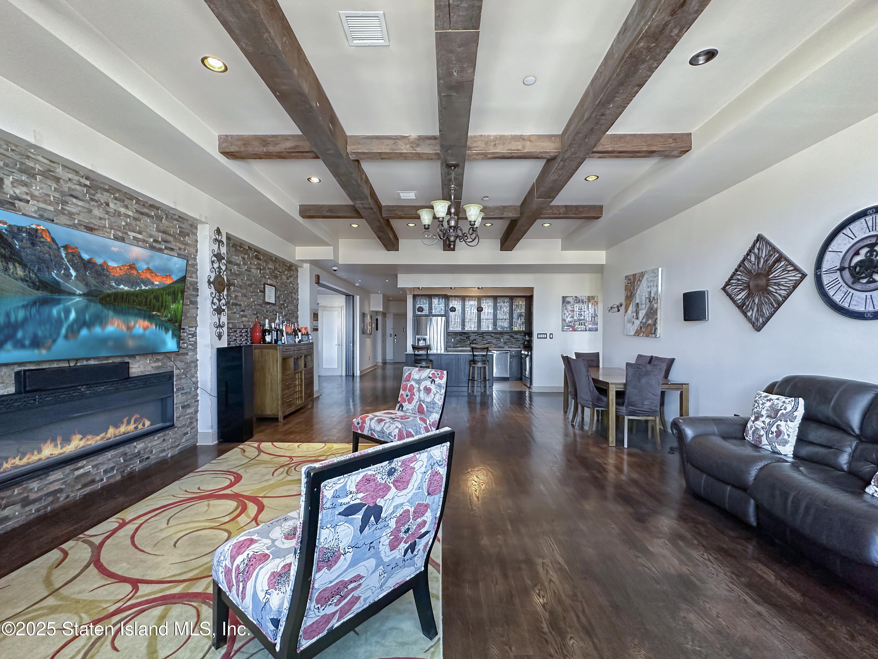 90 Bay Street Landing, Unit 9C Staten Island, NY 10301 - Photo 7 of 38 a outdoor living space with furniture and a fireplace