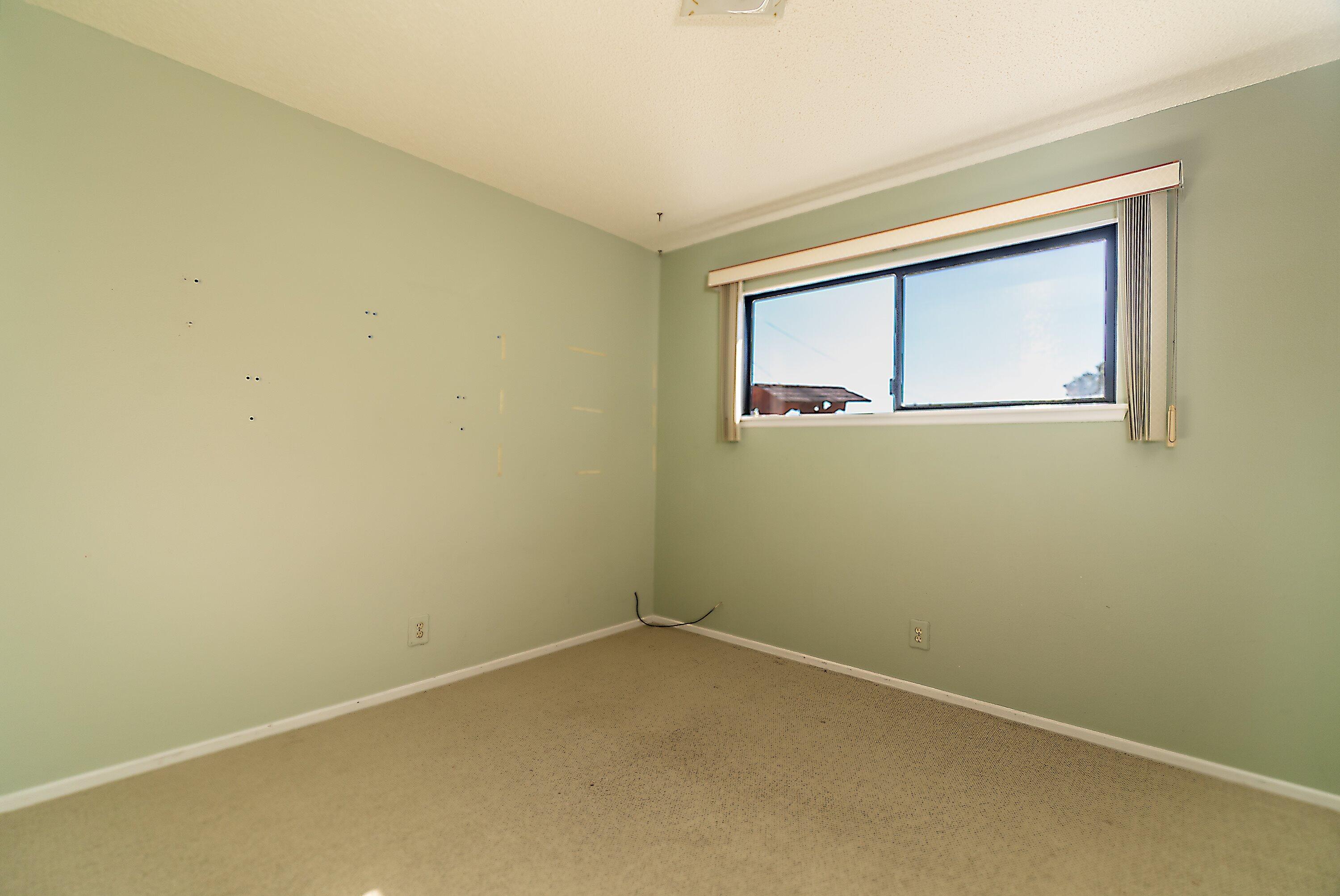 4076 Constellation Road Lompoc, CA 93436 - Photo 11 of 21 an empty room with a window