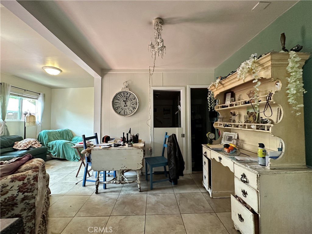 1753 16th Street Santa Monica, CA 90404 - Photo 10 of 11 a living room with granite countertop furniture and a clock