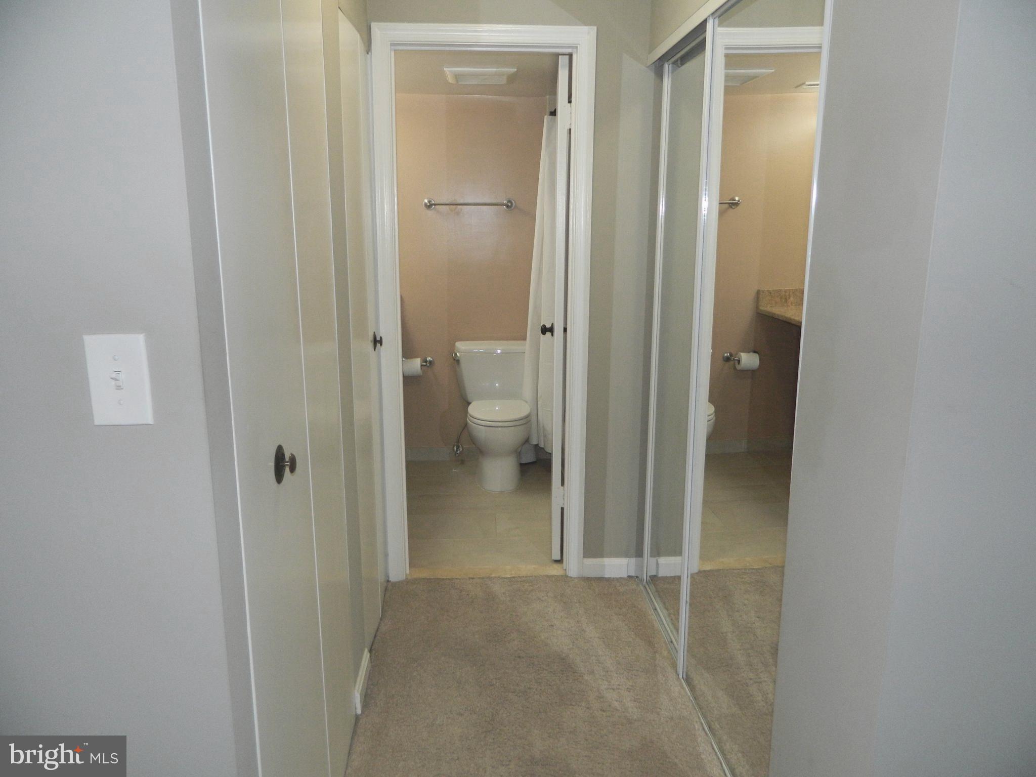 5936 Cove Landing Road, Unit 202B Burke, VA 22015 - Photo 15 of 21 Master Bedroom Closets and Master Bath