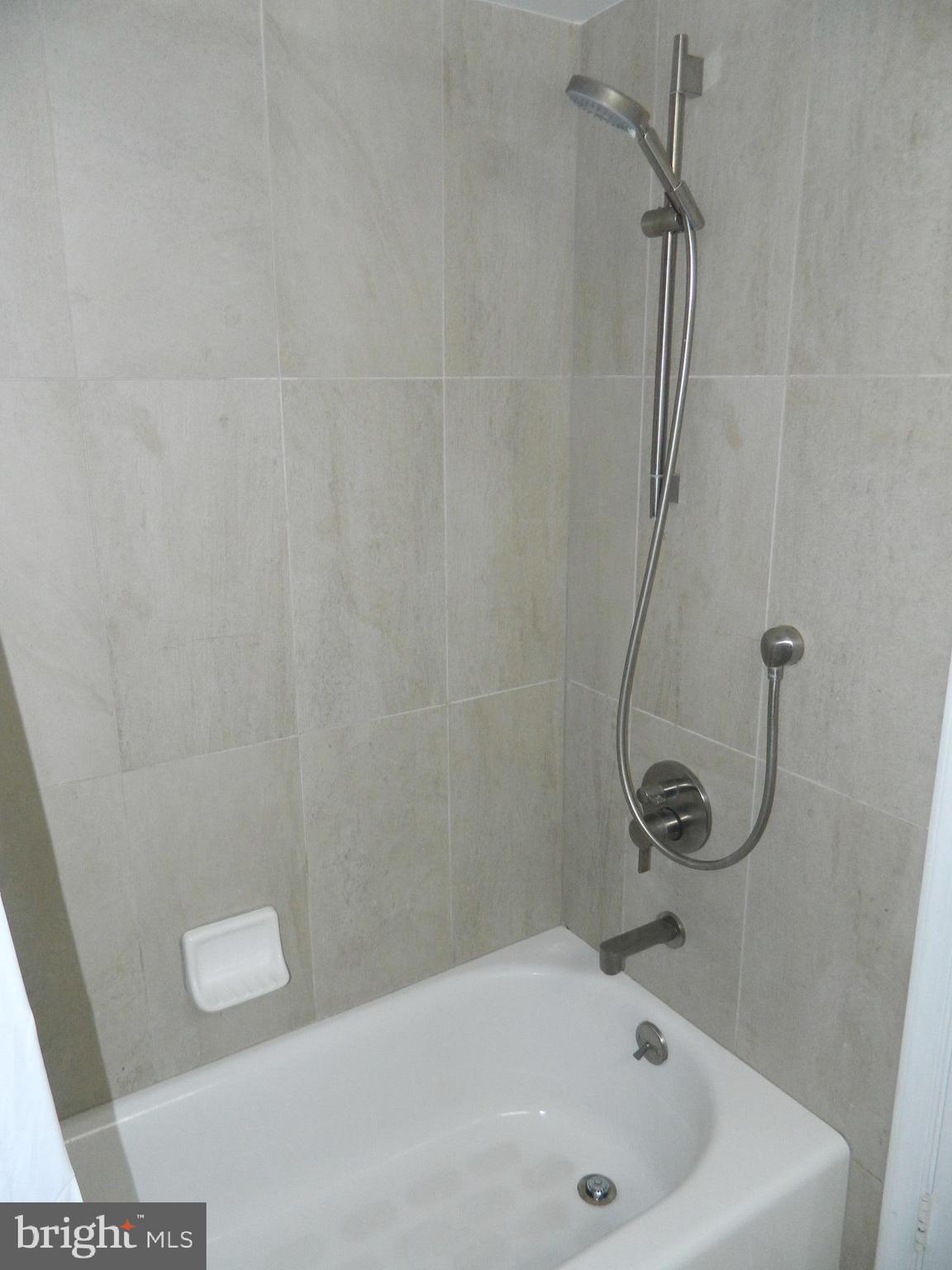 5936 Cove Landing Road, Unit 202B Burke, VA 22015 - Photo 17 of 21 Master Bath Tub and Shower