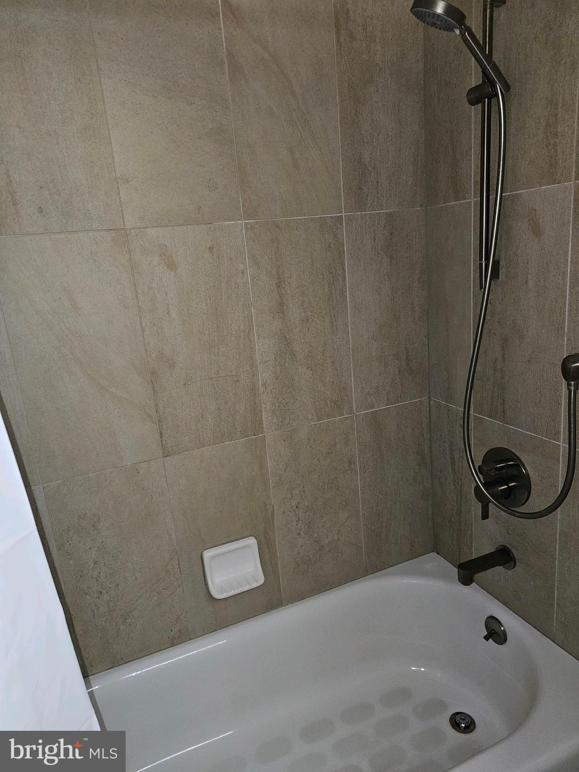 5936 Cove Landing Road, Unit 202B Burke, VA 22015 - Photo 20 of 21 Master Bathroom Tub and Shower