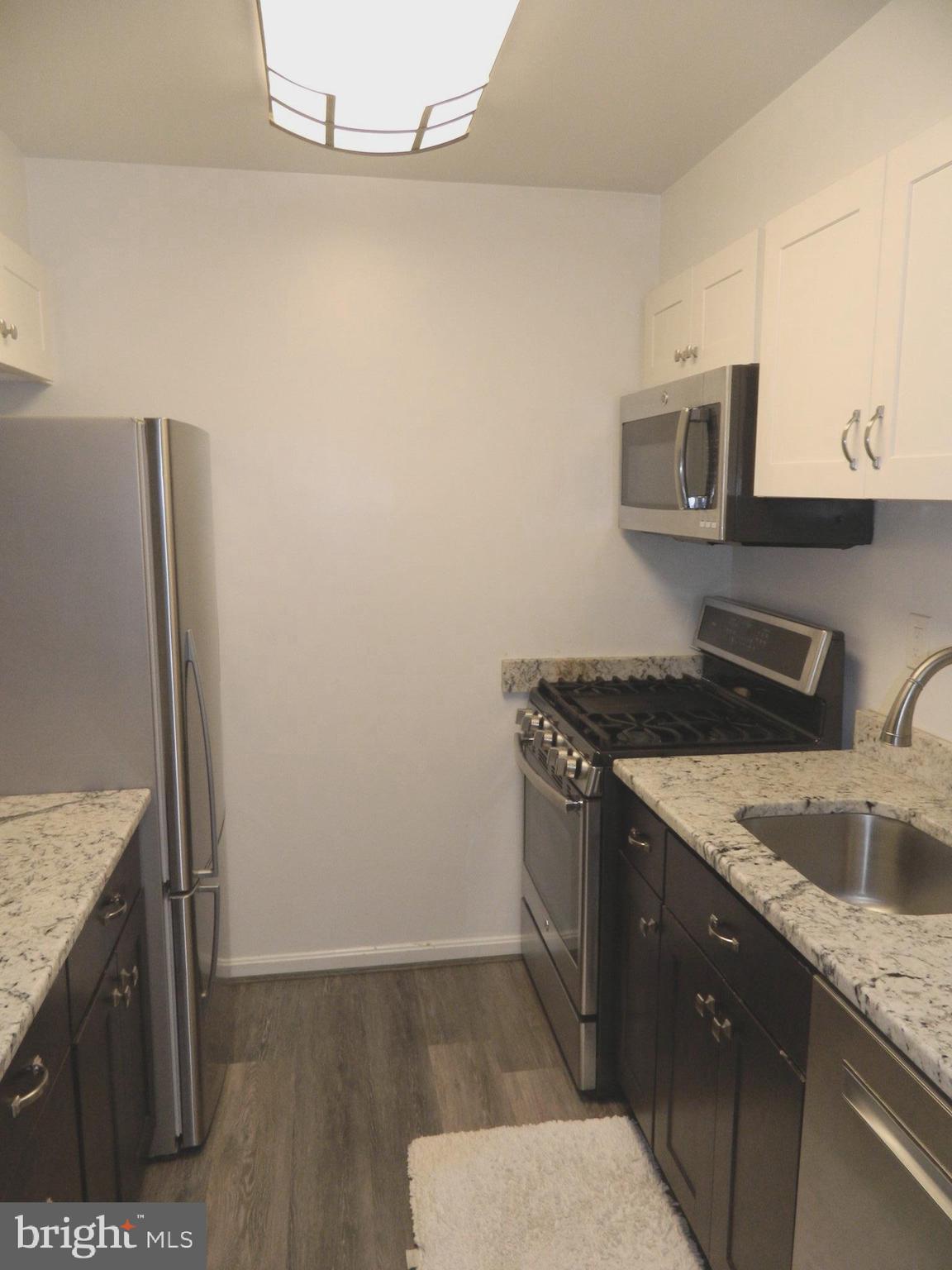 5936 Cove Landing Road, Unit 202B Burke, VA 22015 - Photo 5 of 21 Galley Kitchen