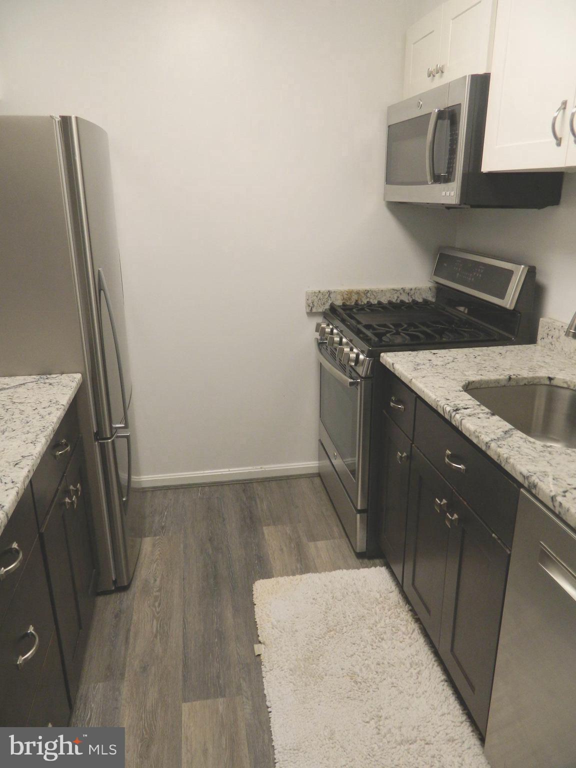5936 Cove Landing Road, Unit 202B Burke, VA 22015 - Photo 6 of 21 Galley Kitchen