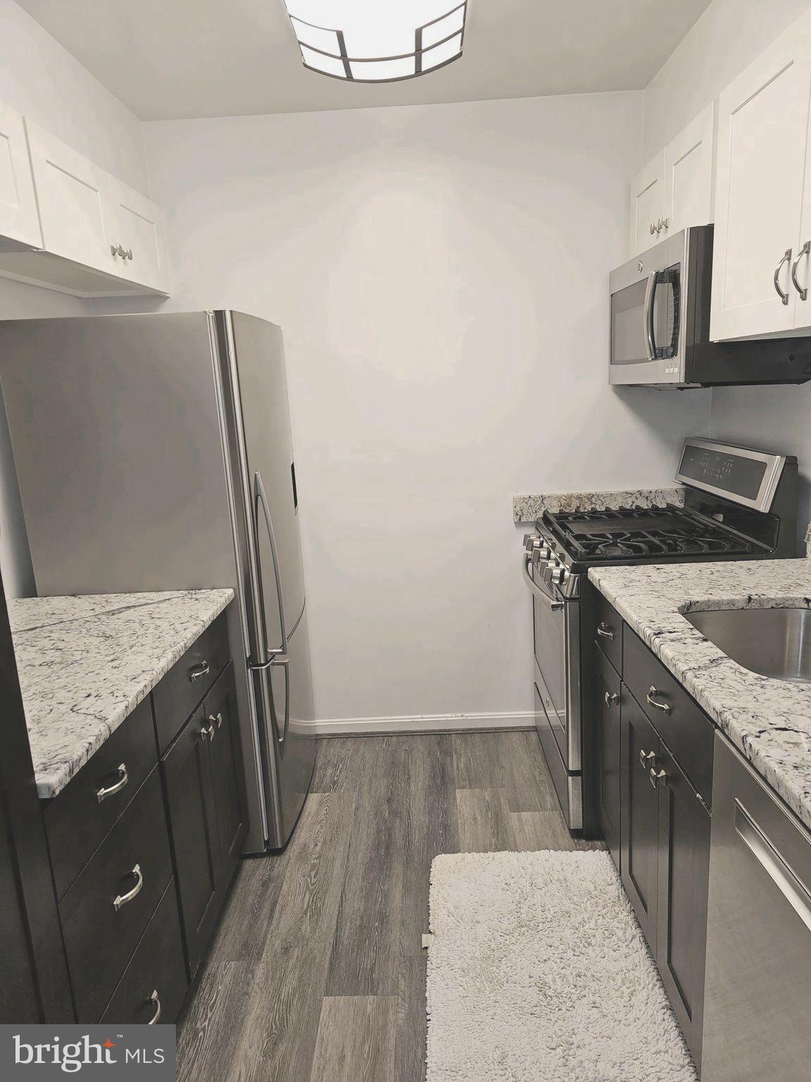 5936 Cove Landing Road, Unit 202B Burke, VA 22015 - Photo 7 of 21 Galley Kitchen