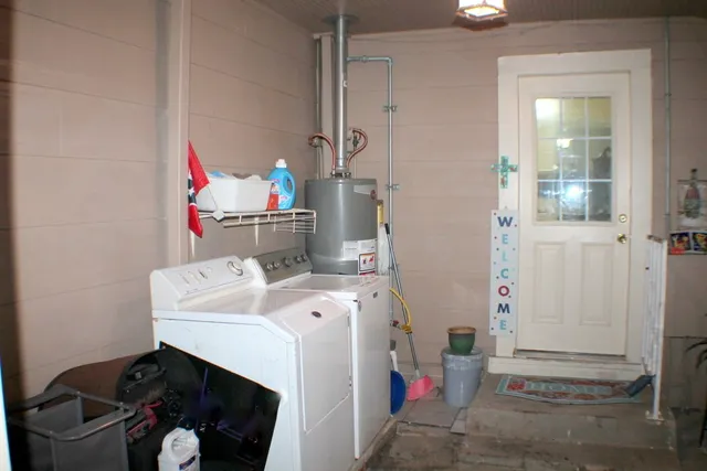 a utility room with dryer and washer