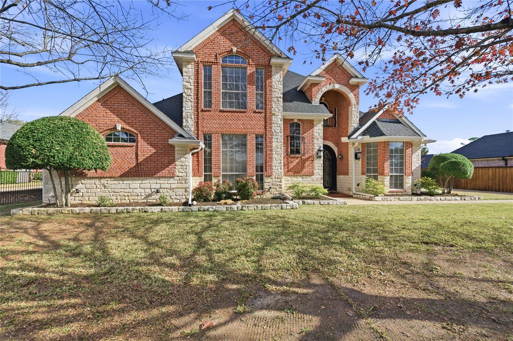front view of house with a yard