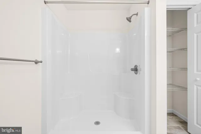 a view of room with white walls