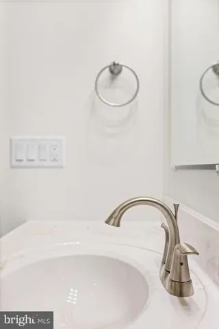 a bathroom with a sink toilet and vanity
