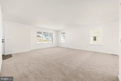 a bathroom with a sink toilet and a mirror