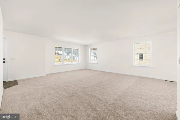a bathroom with a sink toilet and a mirror