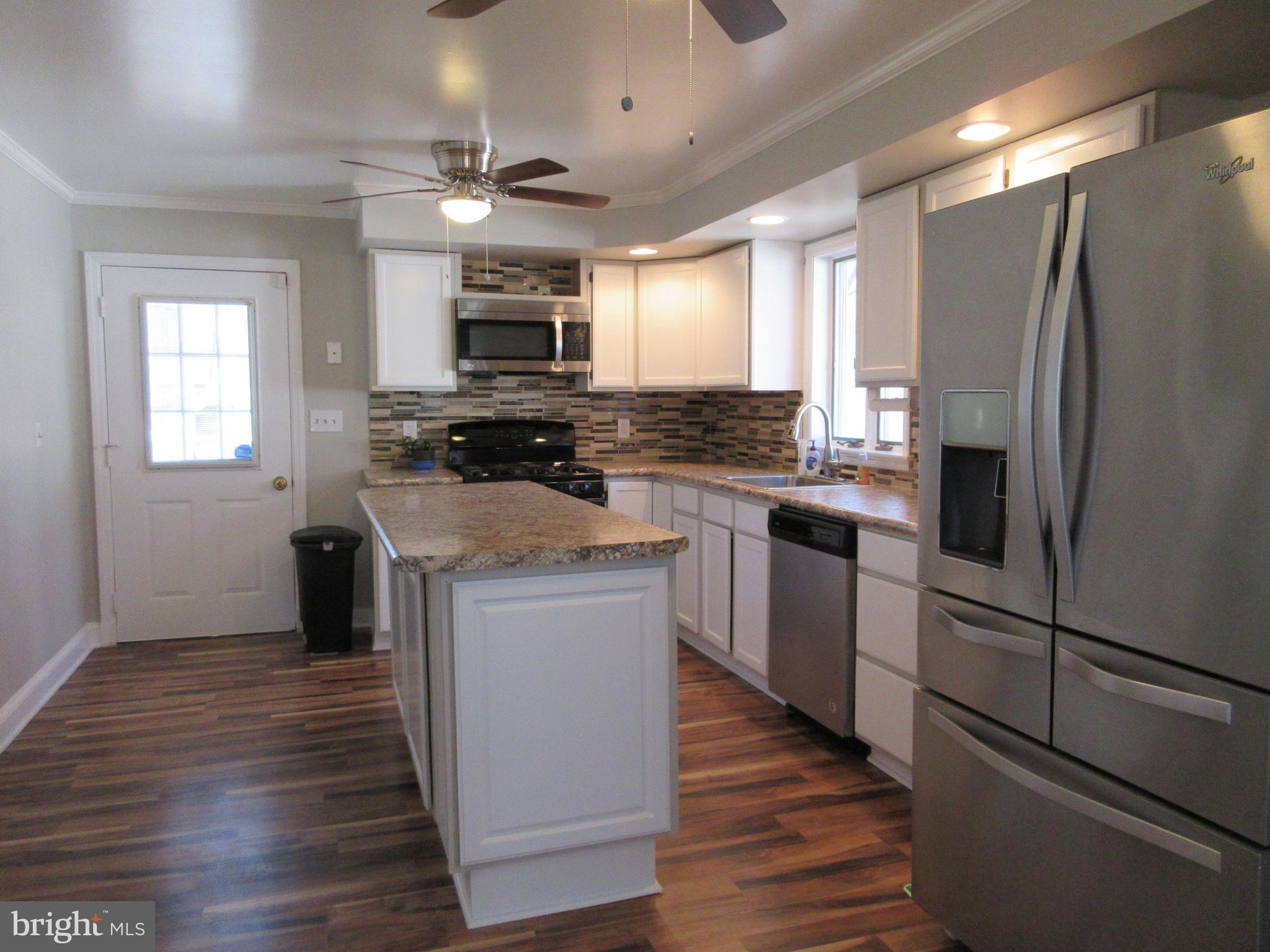 3602 Florida Road Windsor Mill, MD 21244 - Photo 5 of 49 New floors, counter-tops, updated appliances!