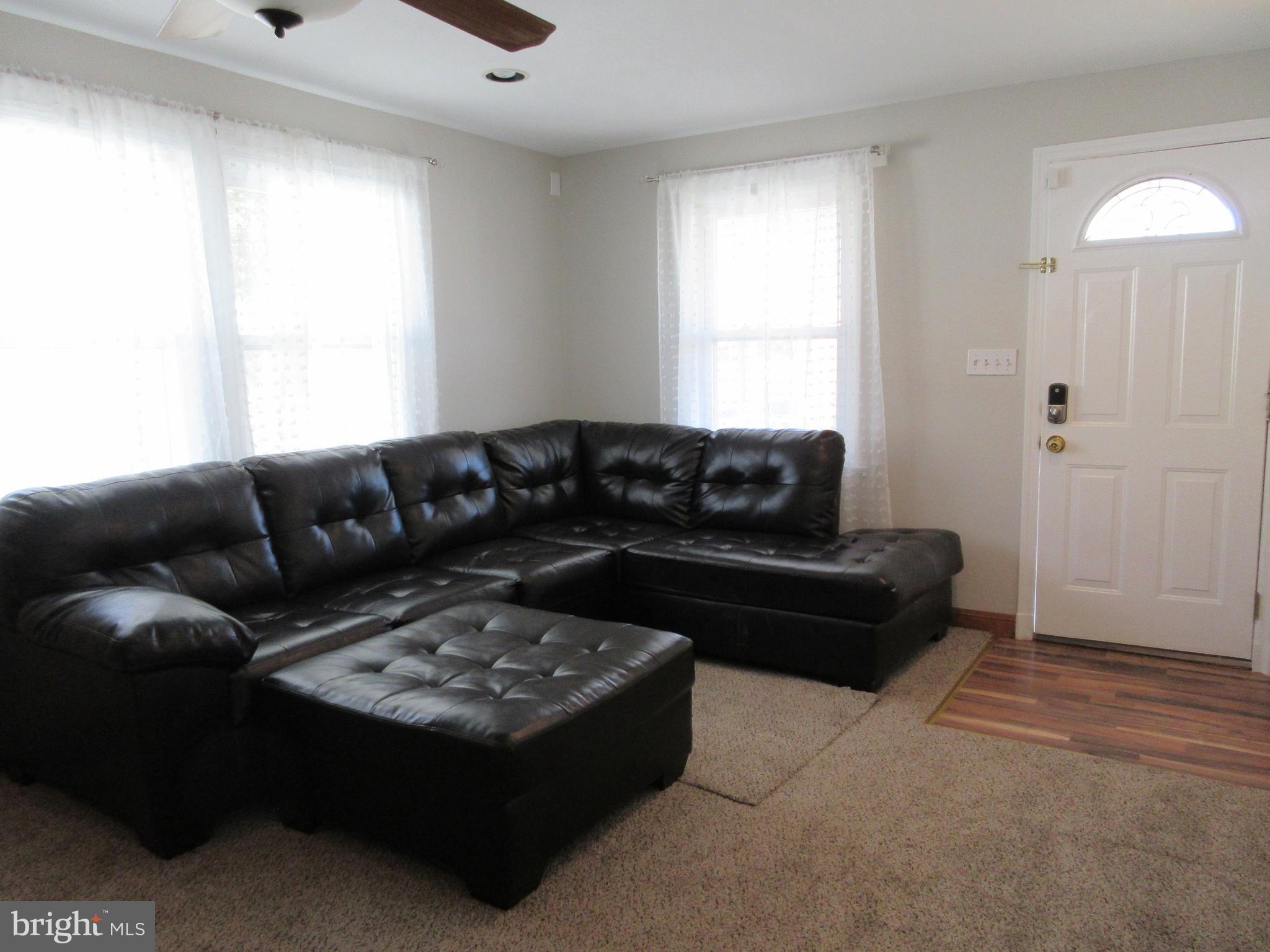 3602 Florida Road Windsor Mill, MD 21244 - Photo 10 of 49 Living room has all new carpet and fresh paint.