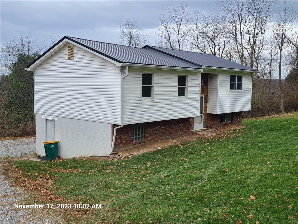 3 Judy Drive Eighty Four, PA 15330 - Photo 18 of 19 a front view of a house with a yard