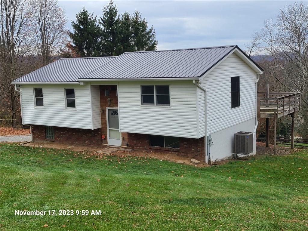 3 Judy Drive Eighty Four, PA 15330 - Photo 2 of 19 a front view of a house with a garden