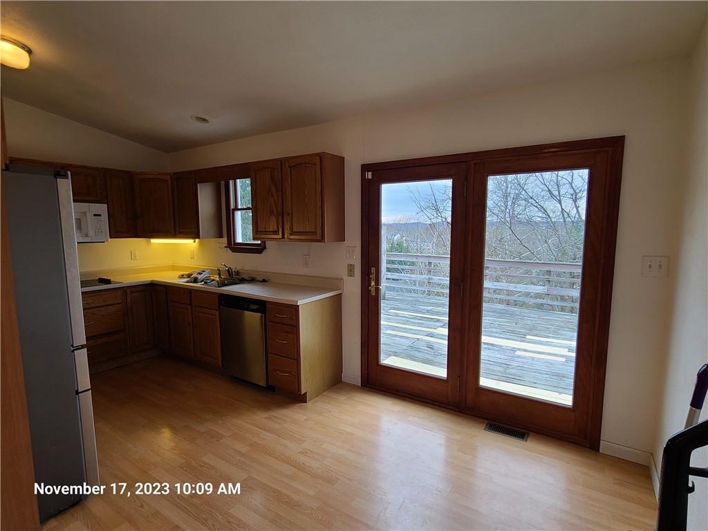 3 Judy Drive Eighty Four, PA 15330 - Photo 8 of 19 a kitchen with granite countertop a stove and a refrigerator
