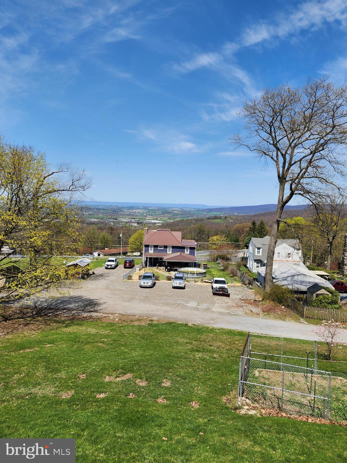 24717 Waldheim Road Cascade, MD 21719 - Photo 2 of 12 a view of a swimming pool with lawn chairs