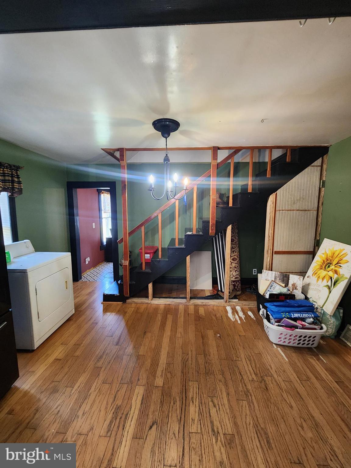 24717 Waldheim Road Cascade, MD 21719 - Photo 9 of 12 a living room with furniture and a wooden floor