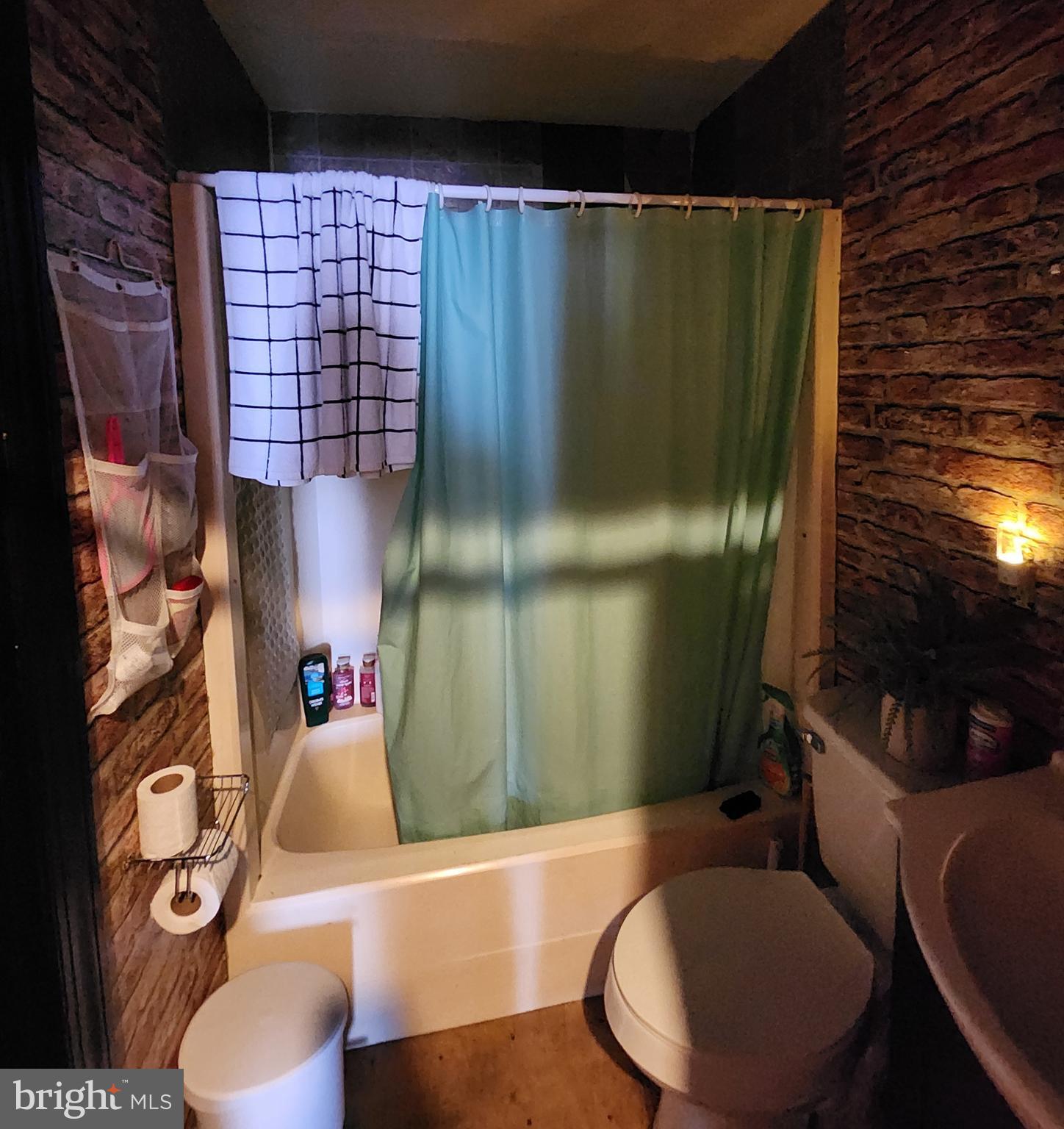 24717 Waldheim Road Cascade, MD 21719 - Photo 10 of 12 a bathroom with a sink toilet and shower