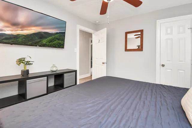 a view of a living room with a flat screen tv