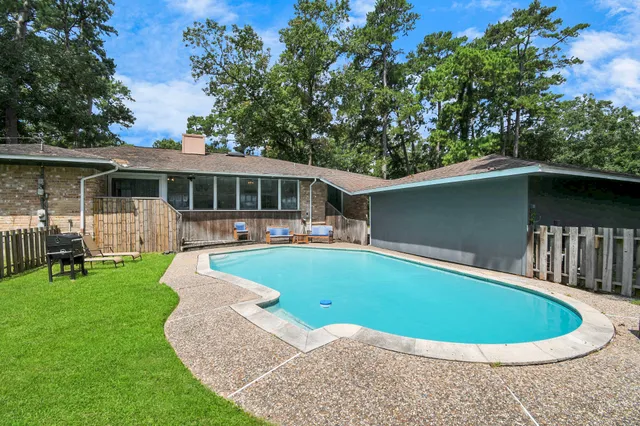 a view of outdoor space yard swimming pool and patio