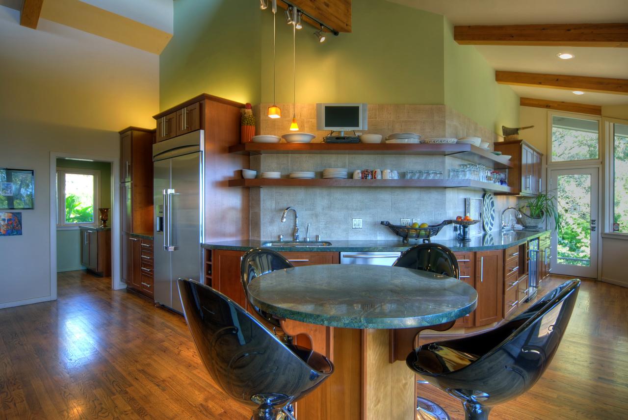 1123 Glenview Road Santa Barbara, CA 93108 - Photo 4 of 15 a kitchen with sink a refrigerator and chairs