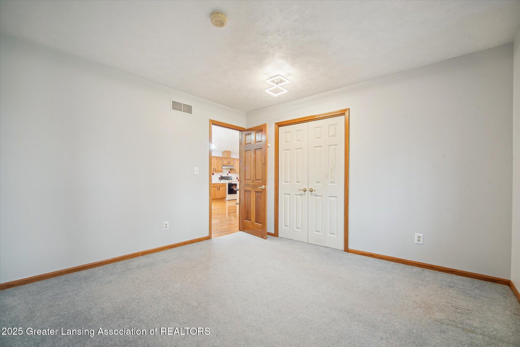 2711 Pine Tree Road Holt, MI 48842 - Photo 19 of 37 21-2711-Pine-Tree-Rd-Holt-MI-48842-Windo