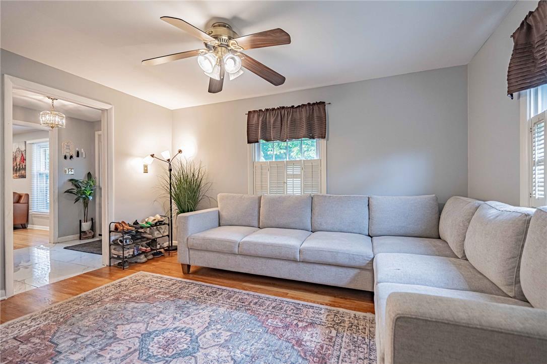 285 Bridle Path Road Bethlehem, PA 18017 - Photo 8 of 54 a living room with furniture and a chandelier