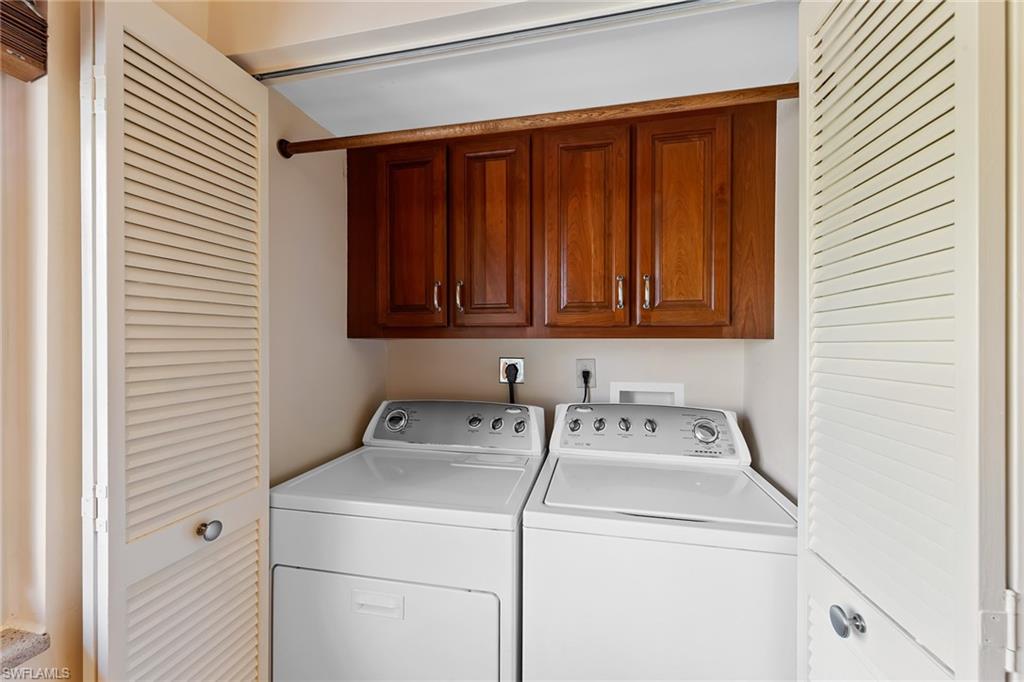 200 Albi Road, Unit 2 Naples, FL 34112 - Photo 21 of 49 a utility room with dryer and washer