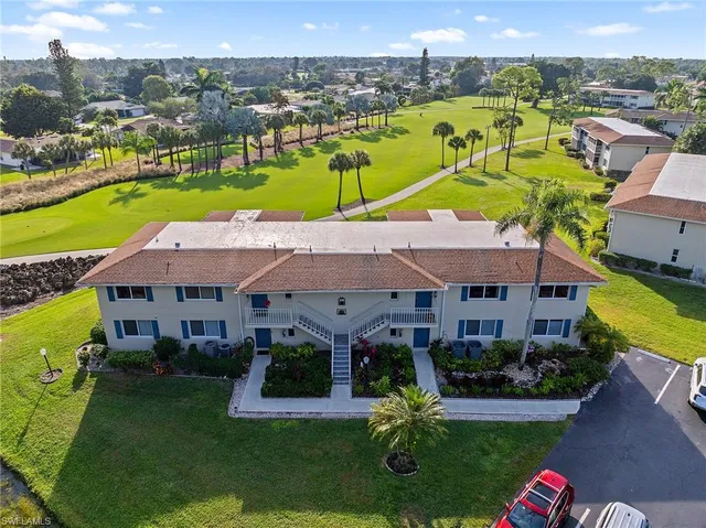 an aerial view of a house with a garden