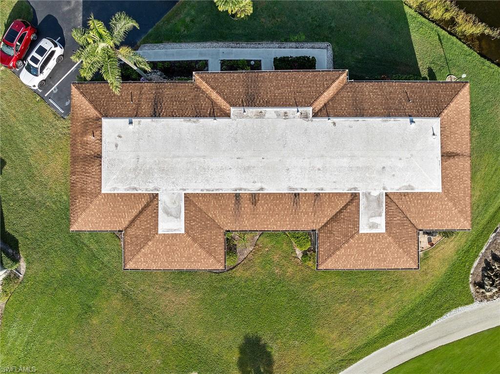 200 Albi Road, Unit 2 Naples, FL 34112 - Photo 41 of 49 an aerial view of a house with a yard