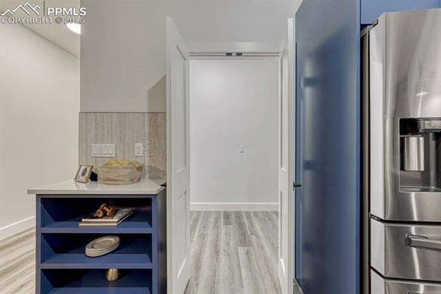 1282 South Crystal Road Lake George, CO 80827 - Photo 17 of 19 Bathroom featuring wood finished floors and baseboards