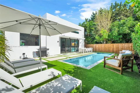 a view of yard with patio