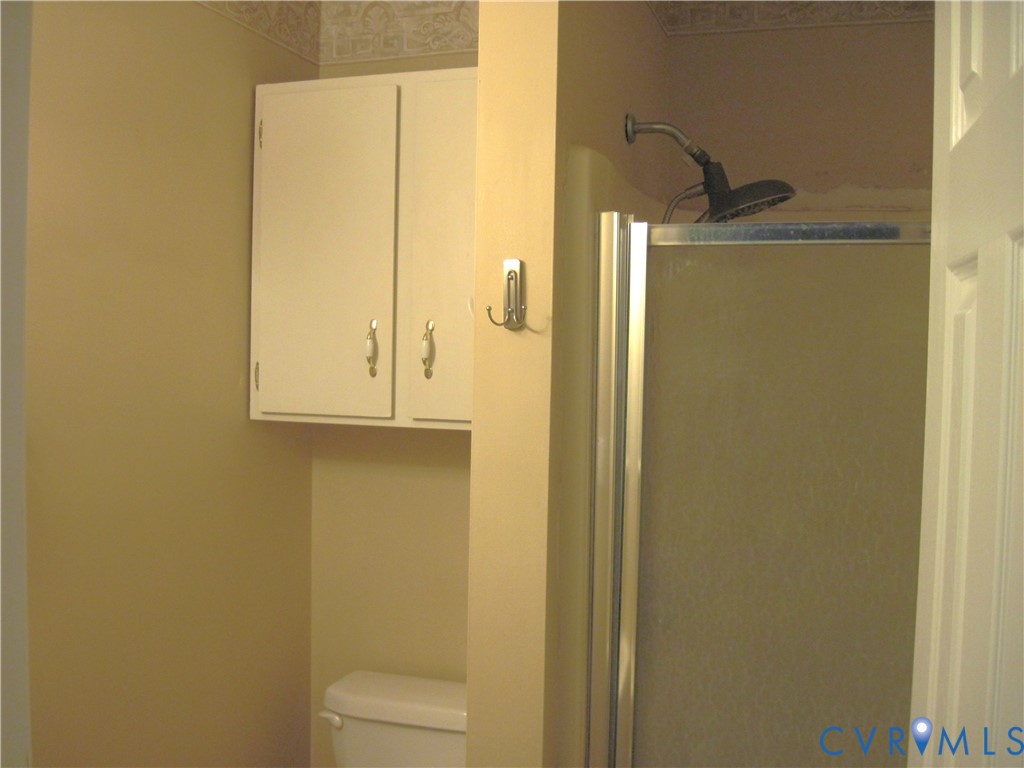 94 Sand Hill Road Toano, VA 23168 - Photo 13 of 20 Primary Bedroom w/ 3 fixture bath.