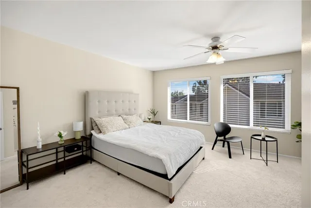 a bed room with a bed and furniture