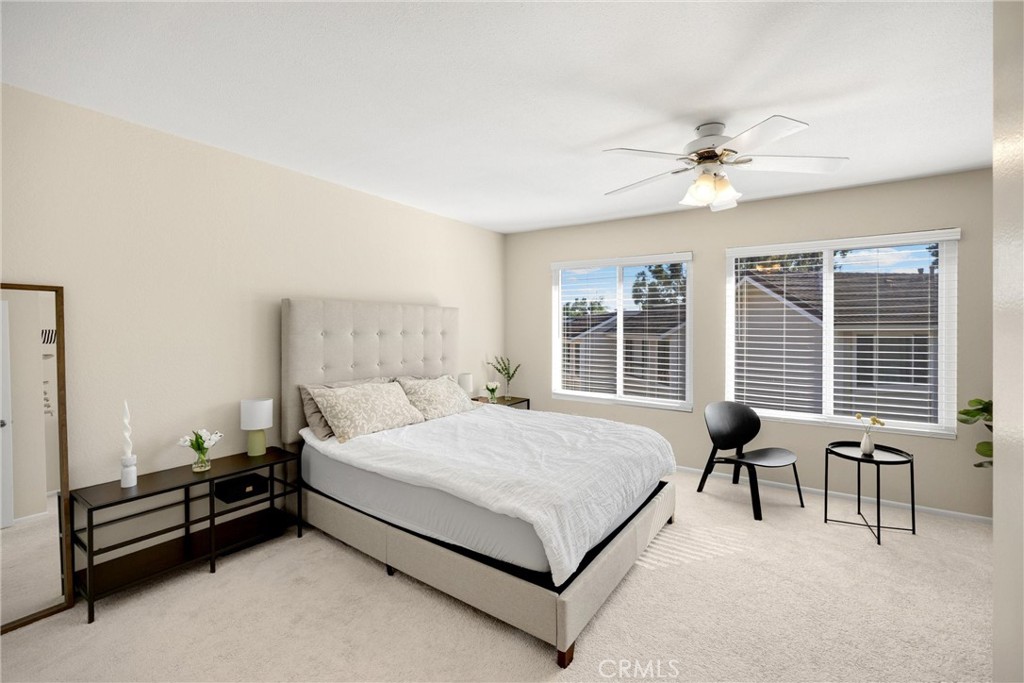 25885 Trabuco Road, Unit 306 Lake Forest, CA 92630 - Photo 24 of 38 a bed room with a bed and furniture