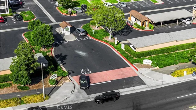 an aerial view of a house with a garden