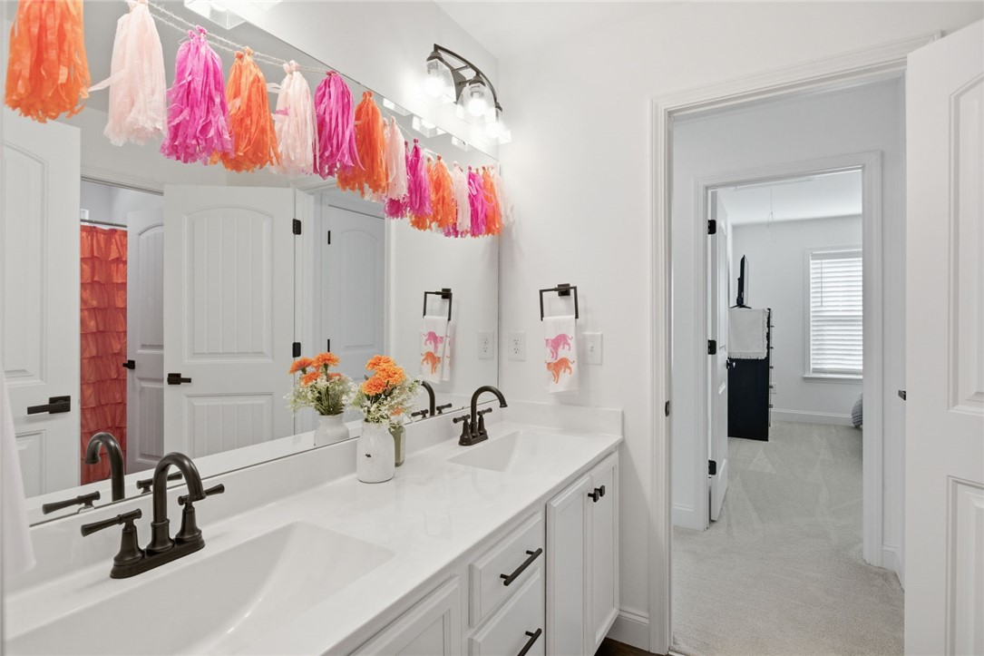 525 16th Circle Walhalla, SC 29691 - Photo 23 of 50 This bright bathroom features a spacious double vanity with modern fixtures and ample storage.