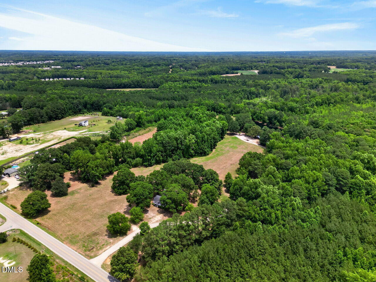 1217 Eagle Rock Road Wendell, NC 27591 - Photo 4 of 17 an aerial view of a house with a yard